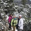 hikers along a snowy White rock loop trail