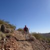 Hiker along the Dixie summit loop hike - Phoenix sonoran preserve
